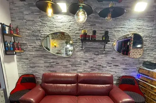 M.H.  barber shop